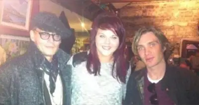 Johnny Depp and Cillian Murphy with a fan in Weir's pub, Multyfarnham, Co Westmeath